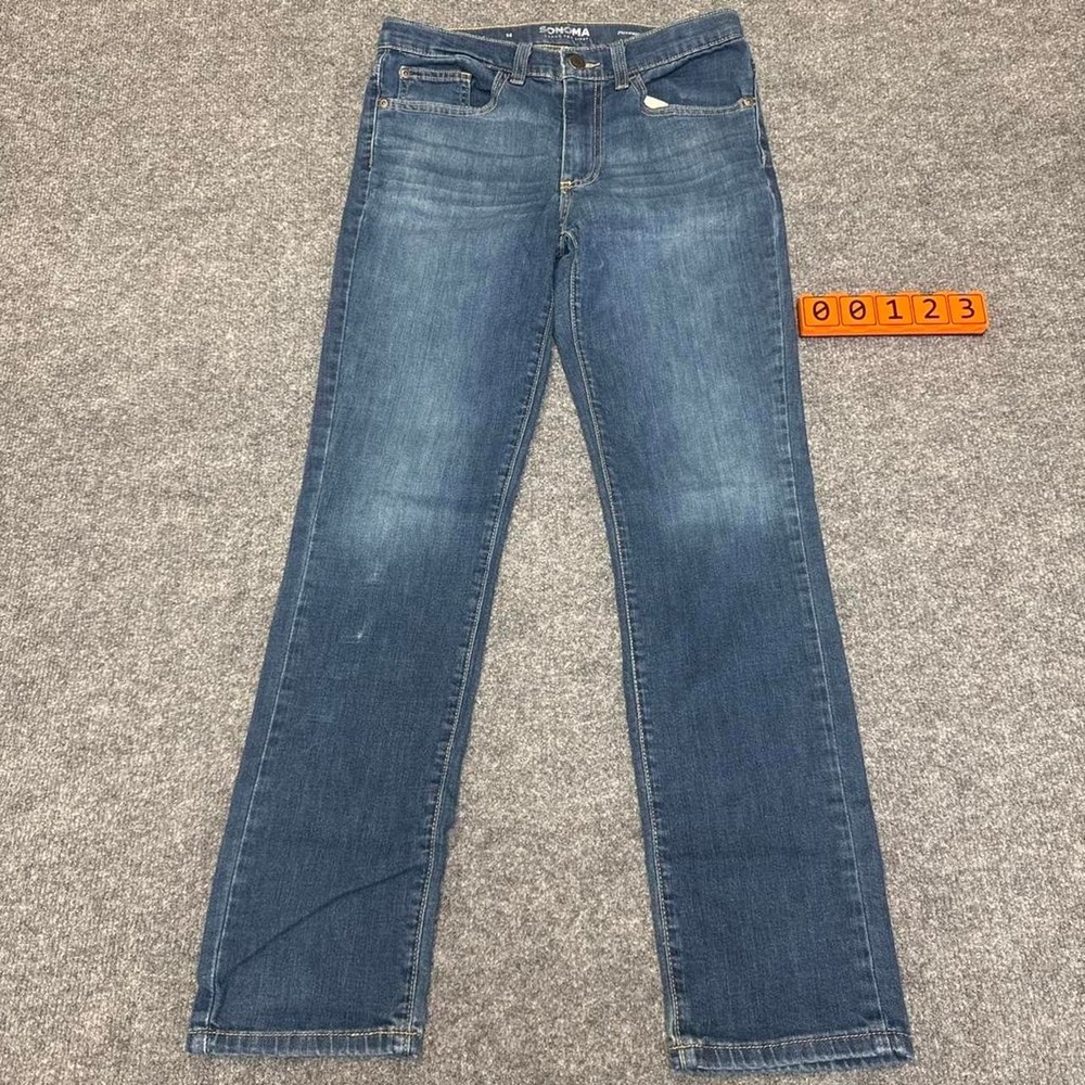 Sonoma Navy blue straight leg jeans with a distressed look. Size 14.